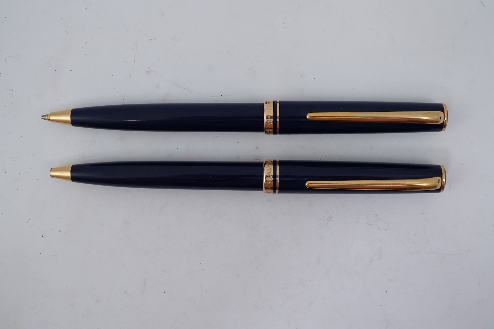 A Montblanc Generation ballpoint pen and propelling pencil set in blue with gold trims